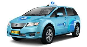 A genuine Blue Bird Taxi with logo on windshield